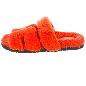 Hermes orange chypre shearling slides